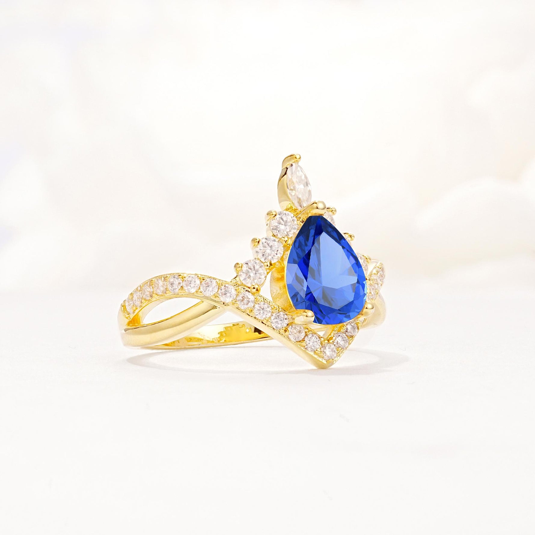 Pear Cut Sapphire Crown Engagement Ring with Chevron Band - Additional view