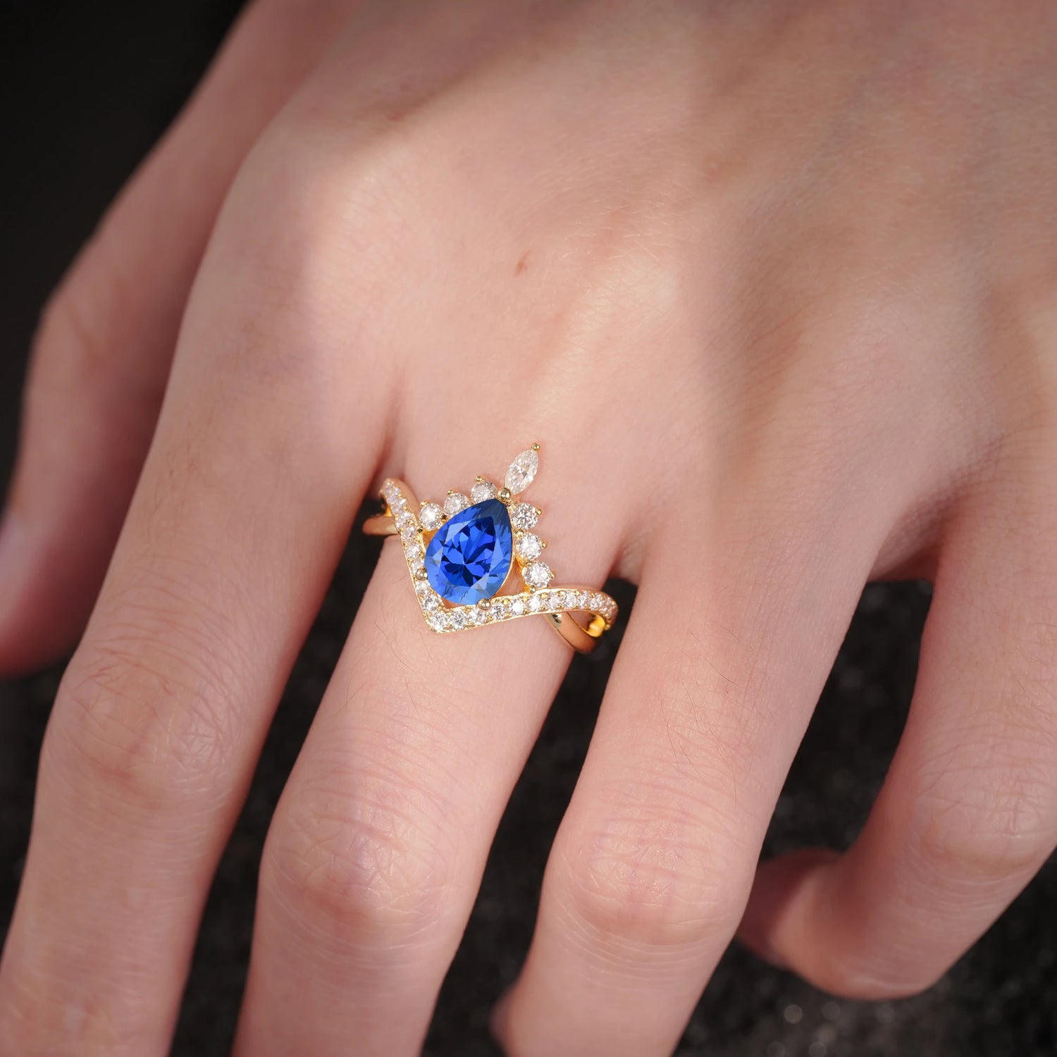Pear Cut Sapphire Crown Engagement Ring with Chevron Band
