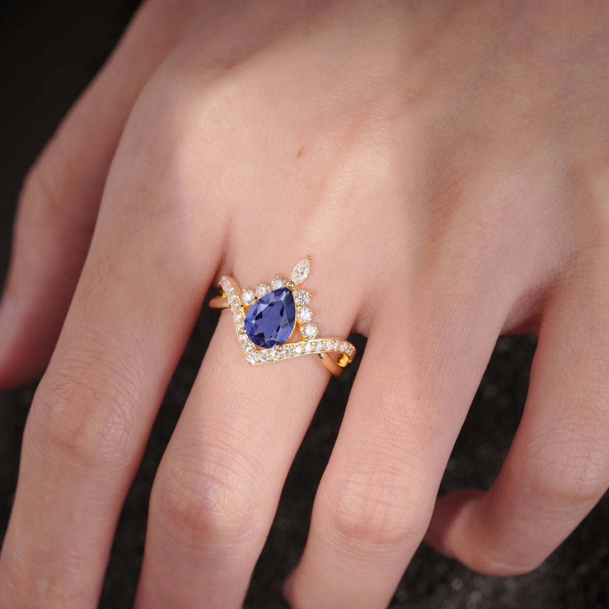 Pear Cut Tanzanite Crown Engagement Ring with Chevron Band