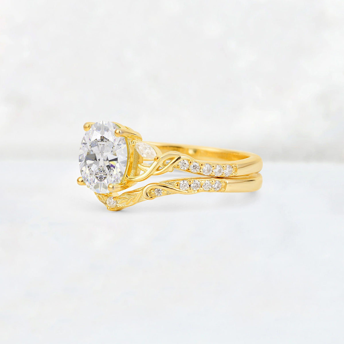 Oval Cut Moissanite Wedding Ring Set with Leaf and Vine Detail - Rose-Gold