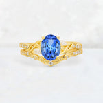 Oval Cut Sapphire Wedding Ring Set with Leaf and Vine Detail - Yellow-Gold