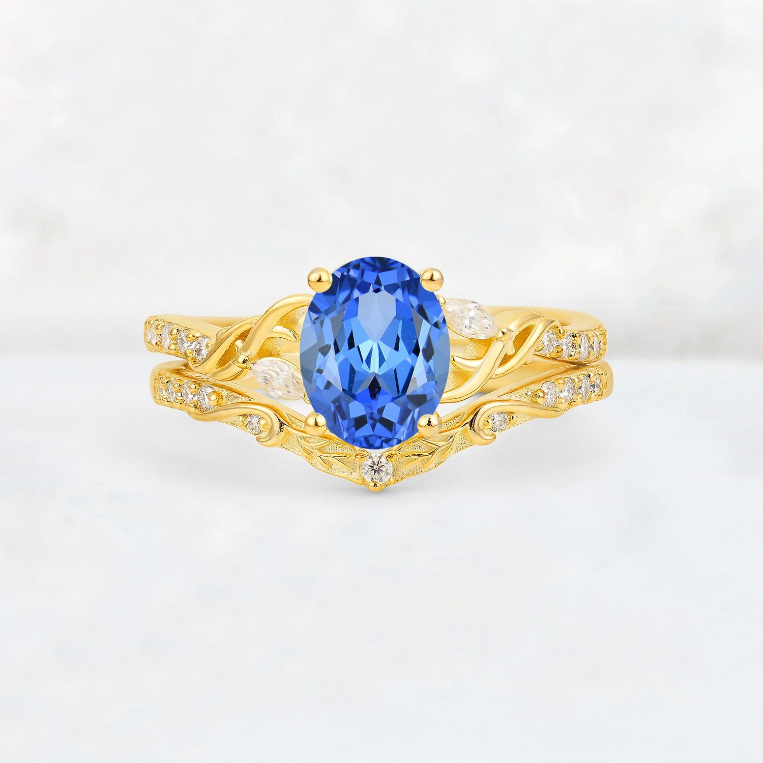 Oval Cut Sapphire Wedding Ring Set with Leaf and Vine Detail - Yellow-Gold