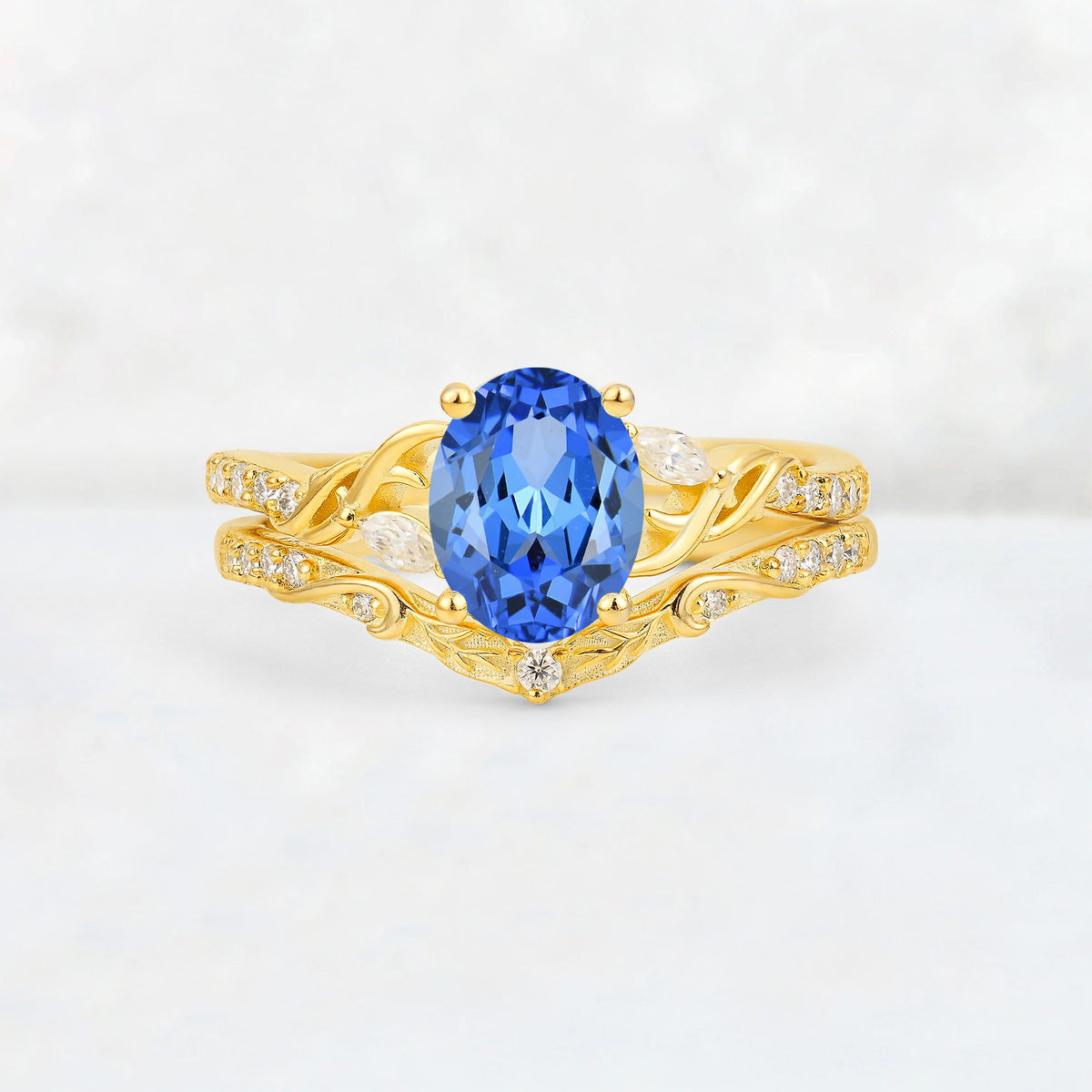 Oval Cut Sapphire Wedding Ring Set with Leaf and Vine Detail - Yellow-Gold