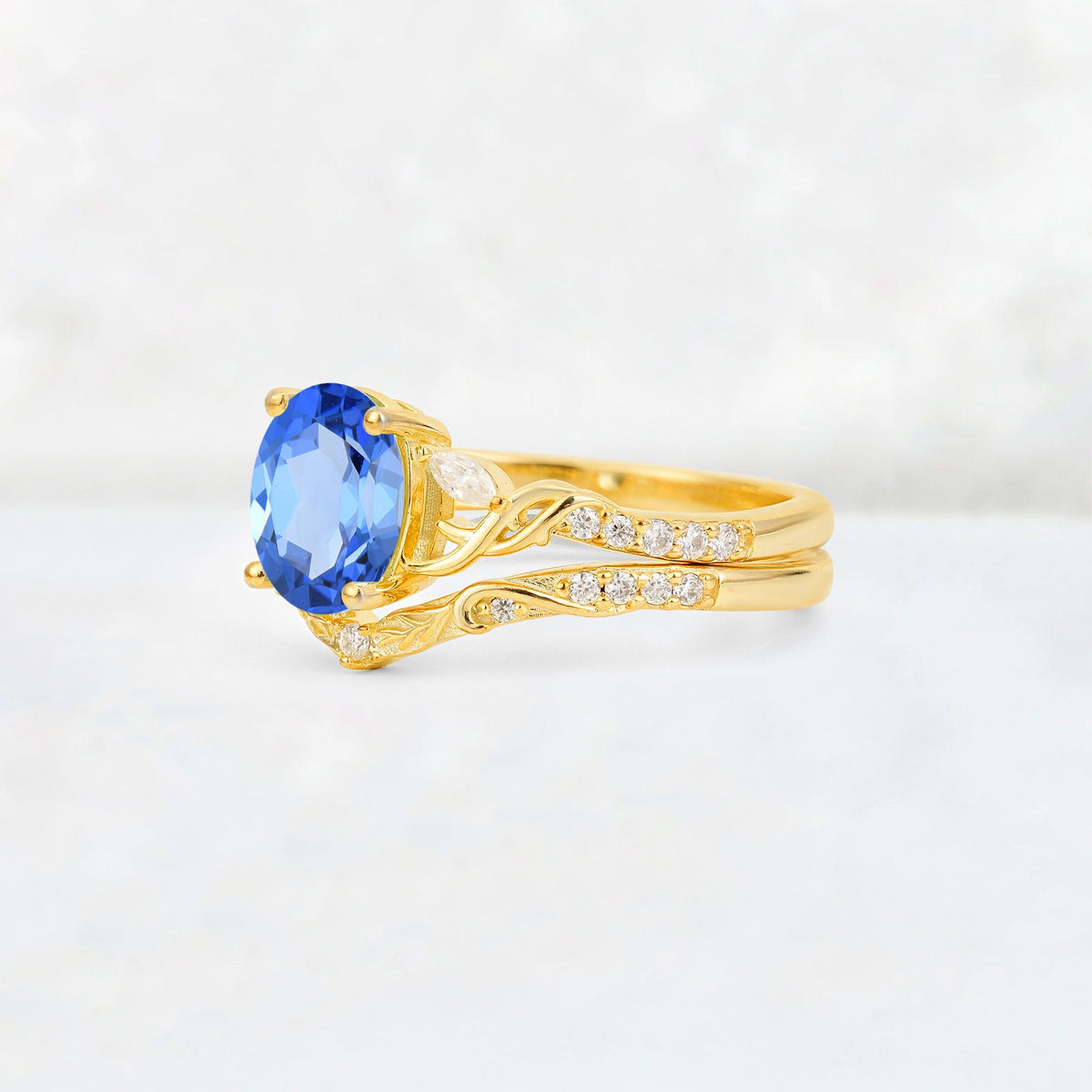 Oval Cut Sapphire Wedding Ring Set with Leaf and Vine Detail - Rose-Gold