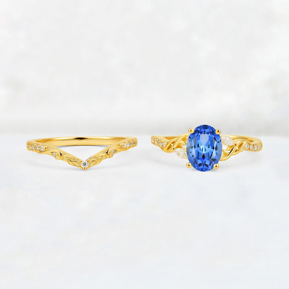 Oval Cut Sapphire Wedding Ring Set with Leaf and Vine Detail - White-Gold