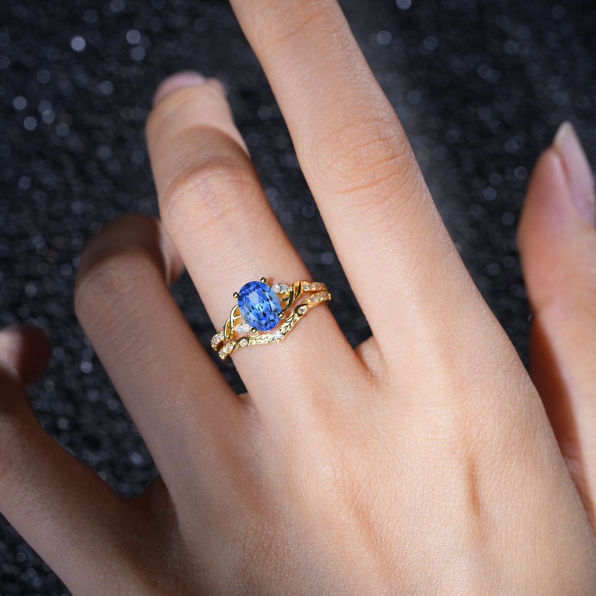 Oval Cut Sapphire Bridal Ring Set with Leaf and Vine Detail