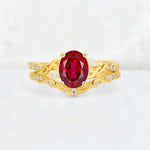 Oval Cut Ruby Wedding Ring Set with Leaf and Vine Detail - Yellow-Gold