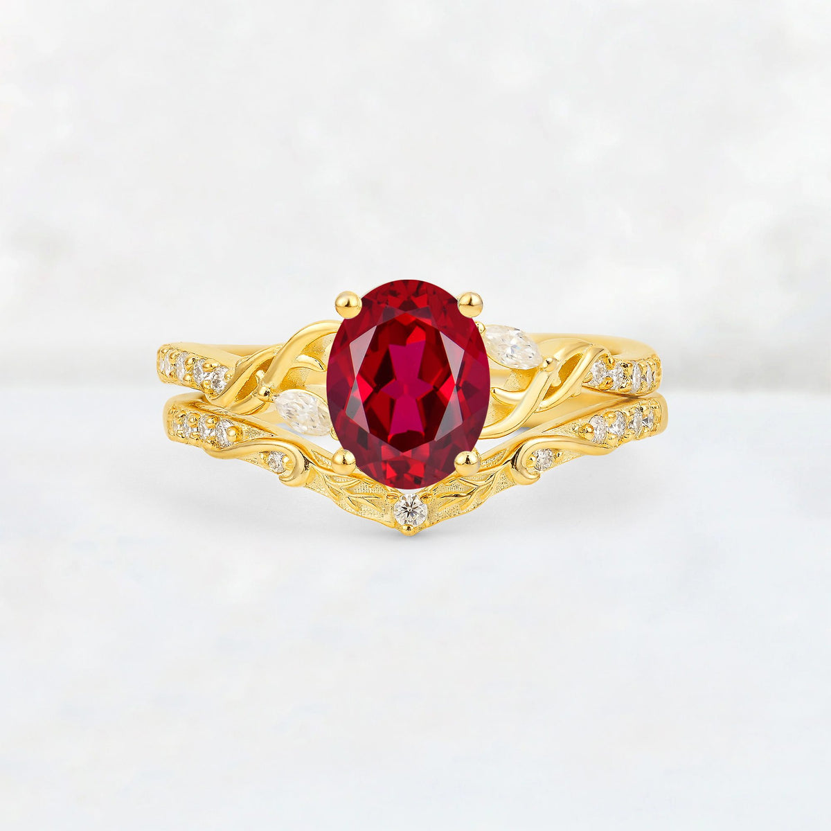 Oval Cut Ruby Wedding Ring Set with Leaf and Vine Detail - Yellow-Gold