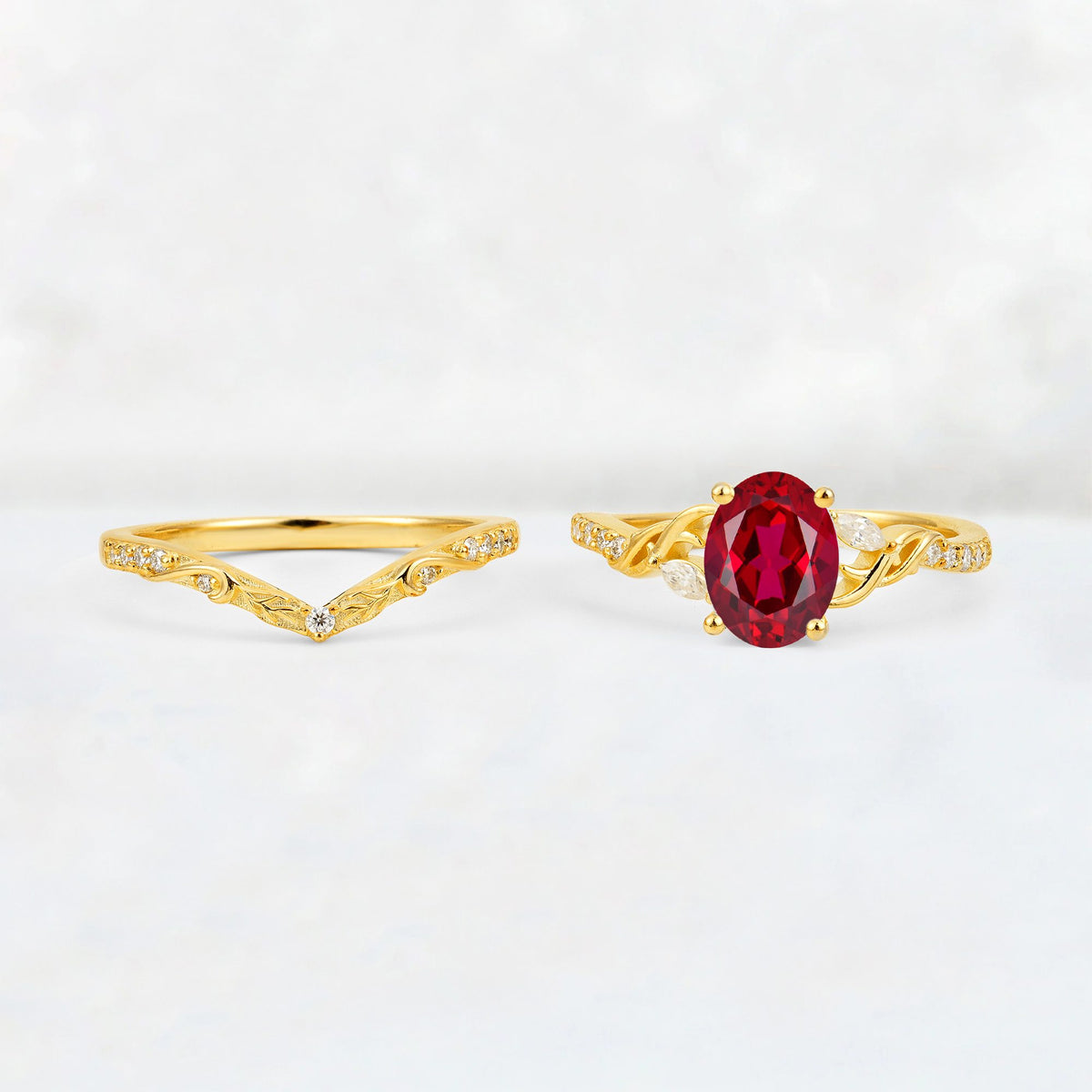 Oval Cut Ruby Wedding Ring Set with Leaf and Vine Detail - White-Gold