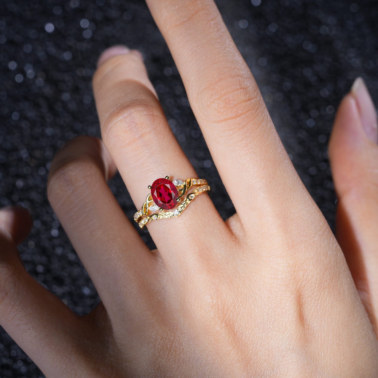 Oval Cut Ruby Bridal Ring Set with Leaf and Vine Detail
