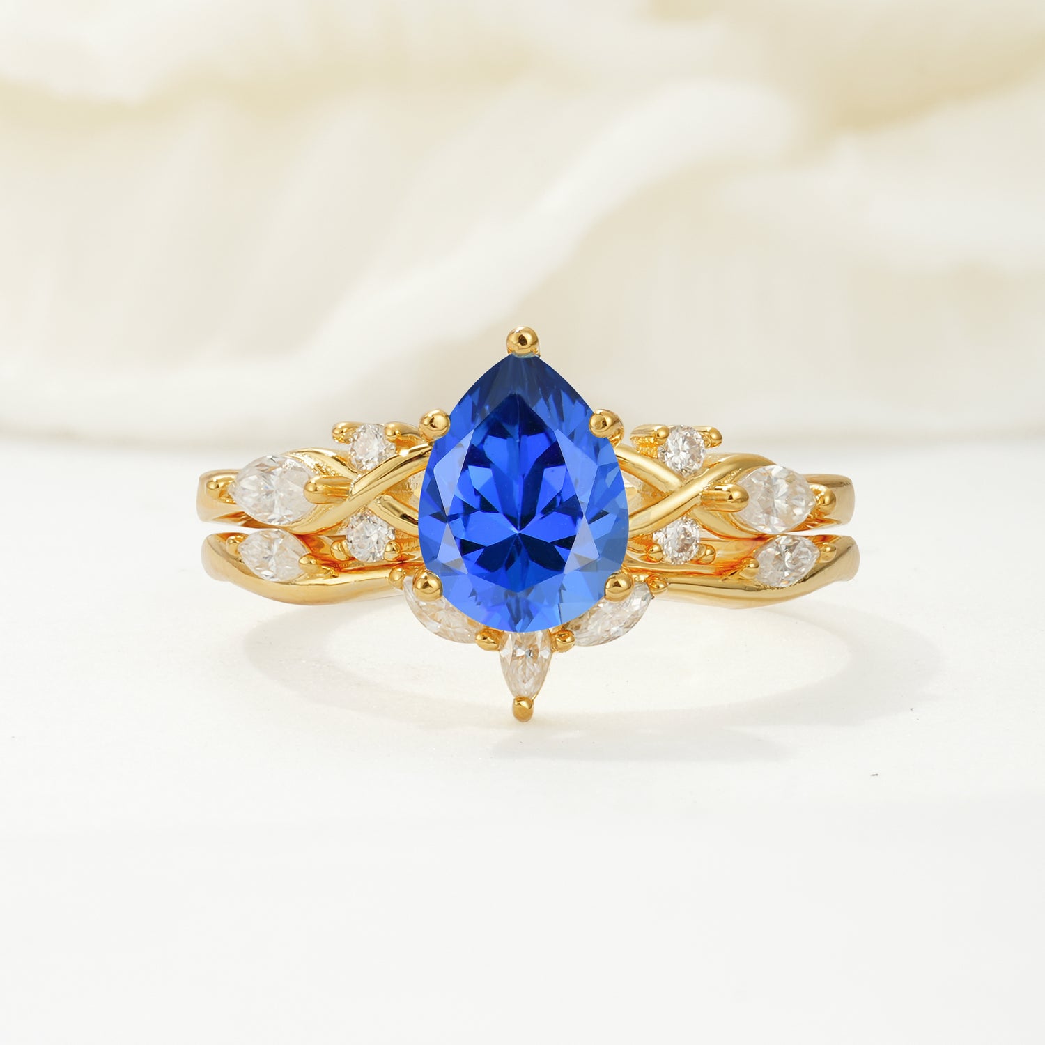 Nature-Inspired Luxury Pear-Cut Sapphire Bridal Ring Set