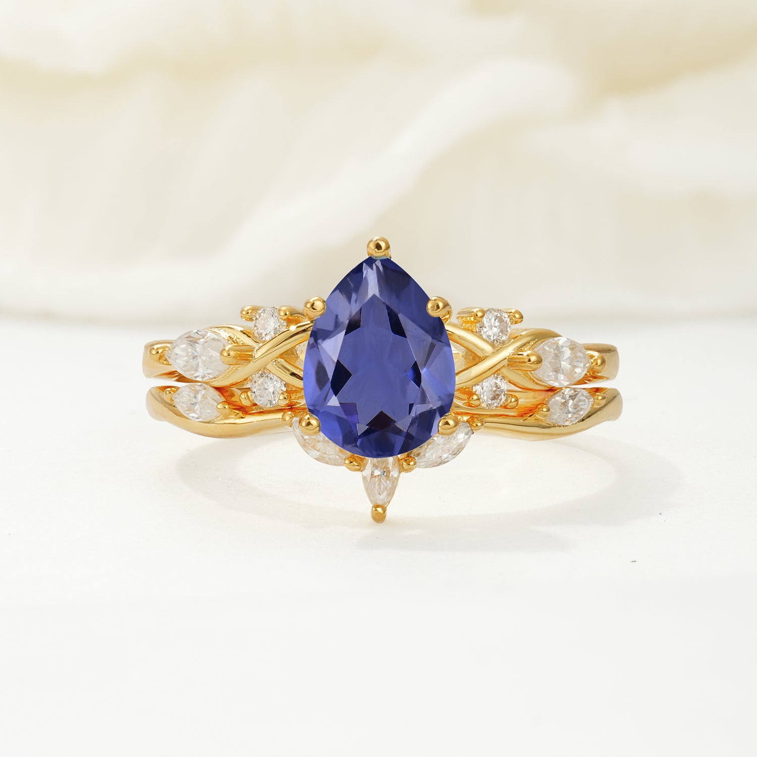 Nature-Inspired Luxury Pear-Cut Tanzanite Bridal Ring Set
