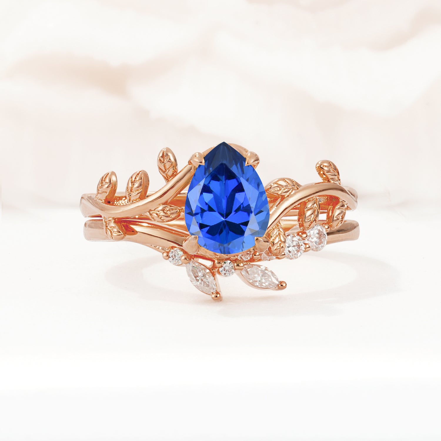 Nature-Inspired Pear Cut Sapphire Bridal Ring Set