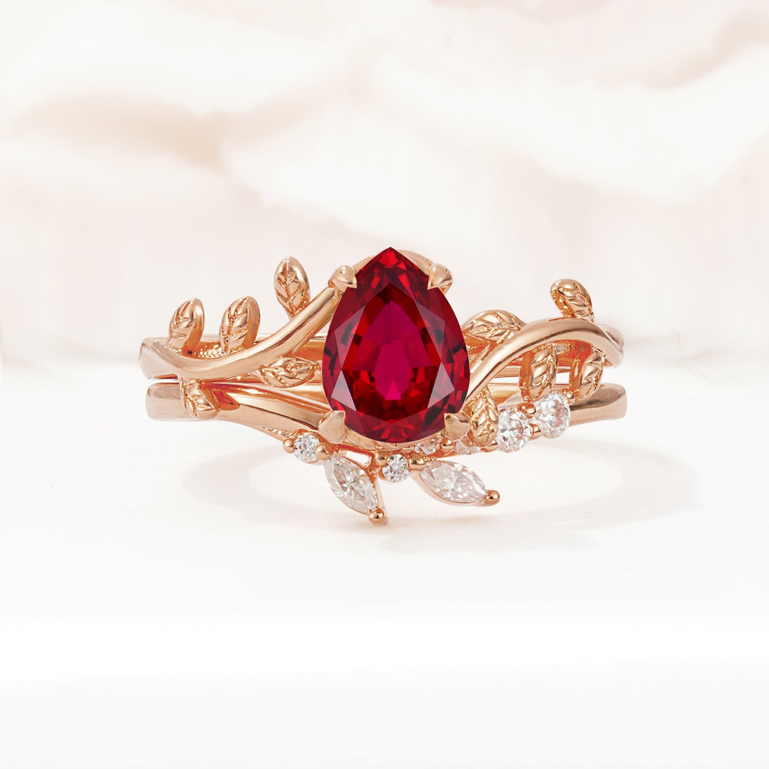 Nature-Inspired Pear Cut Ruby Bridal Ring Set