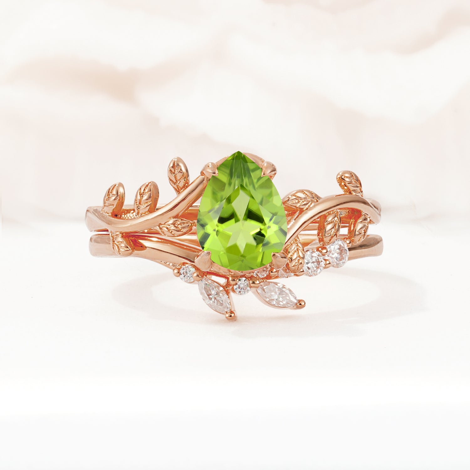 Nature-Inspired Pear Cut Peridot Bridal Ring Set