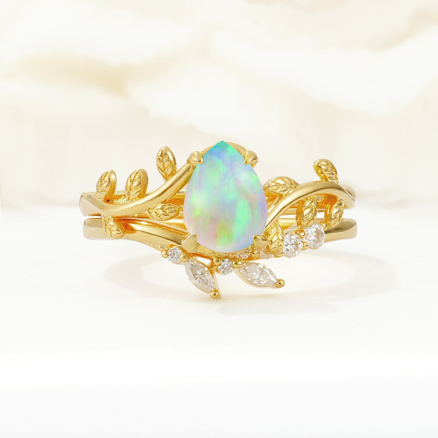Nature-Inspired Pear Cut Opal Bridal Ring Set