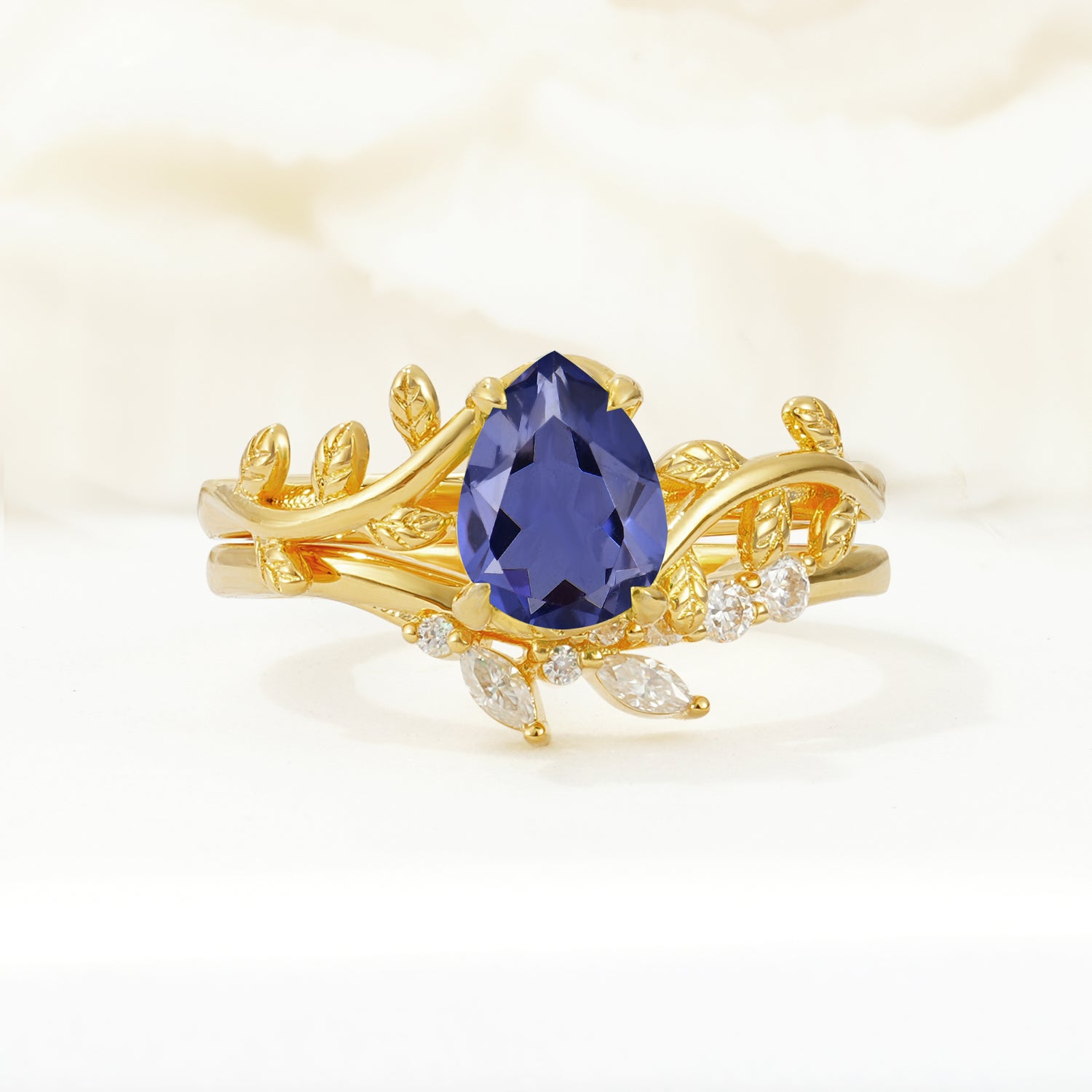 Nature-Inspired Pear Cut Tanzanite Bridal Ring Set