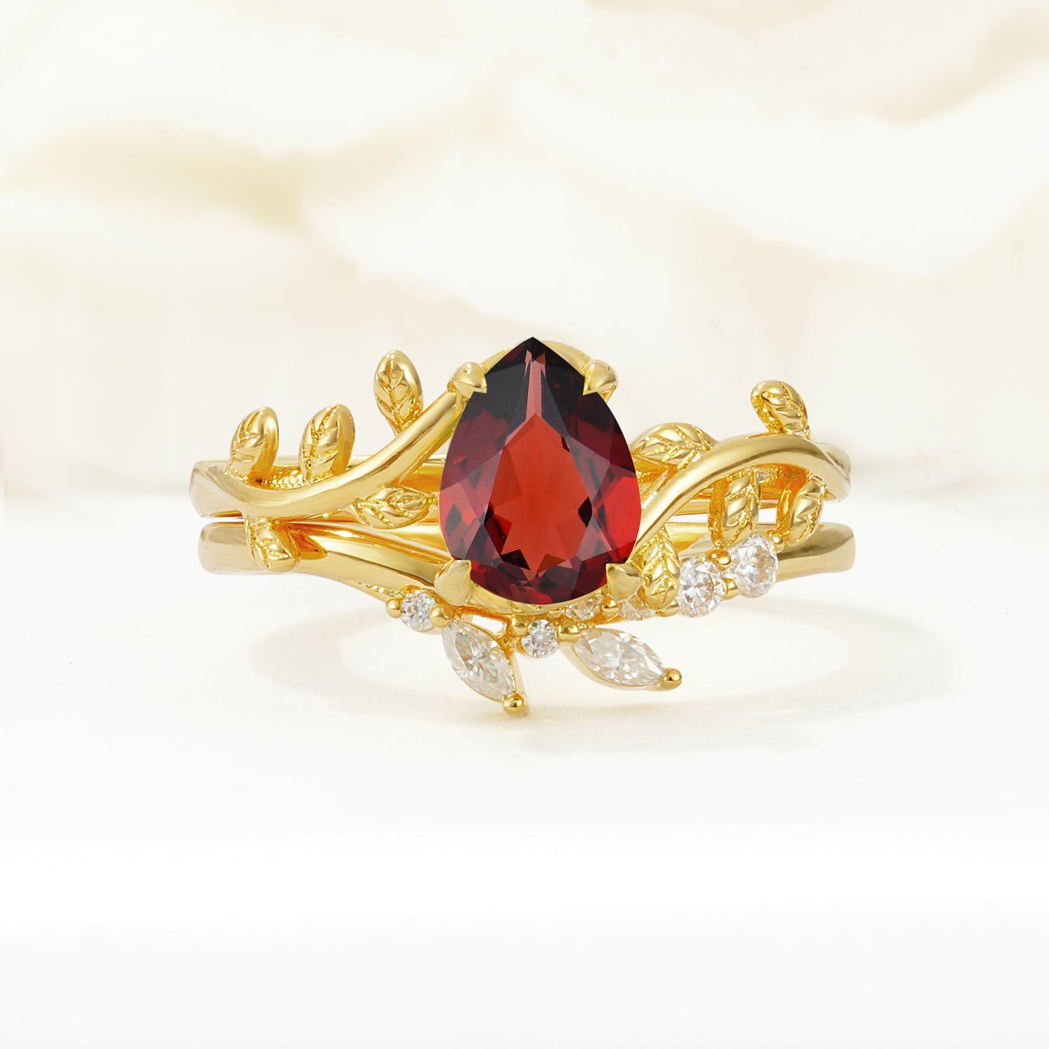 Nature-Inspired Pear Cut Garnet Bridal Ring Set