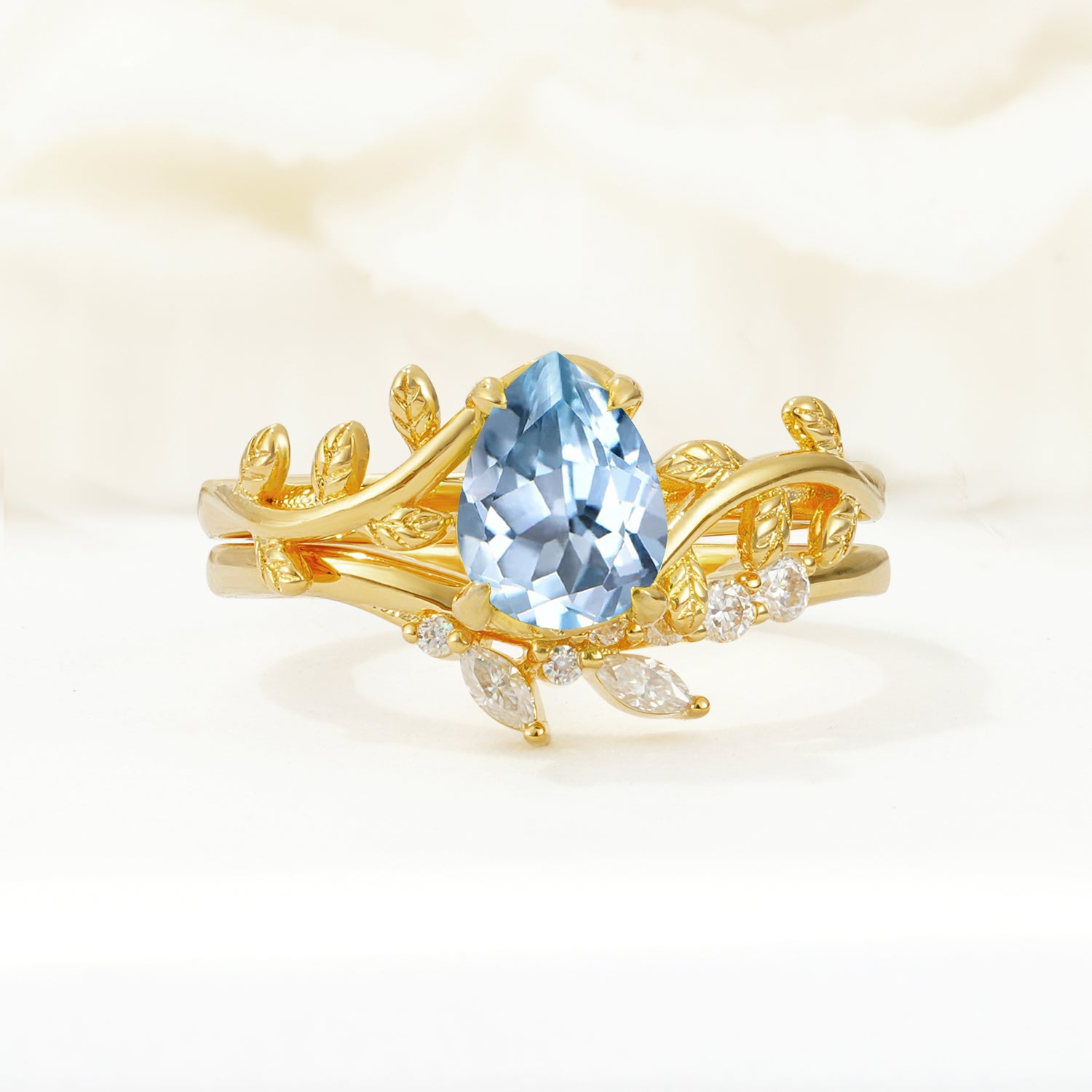 Nature-Inspired Pear Cut Aquamarine Bridal Ring Set