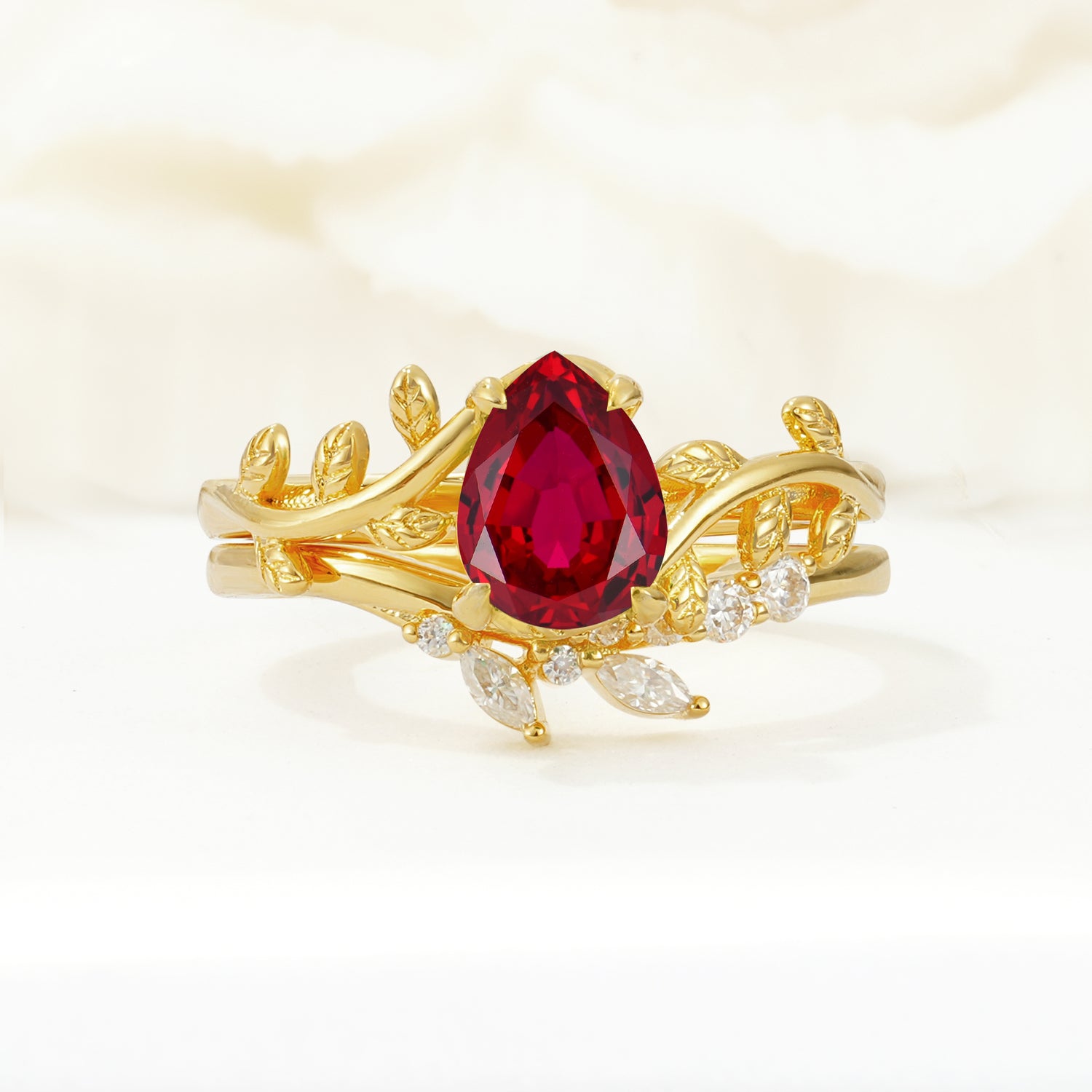 Nature-Inspired Pear Cut Ruby Bridal Ring Set