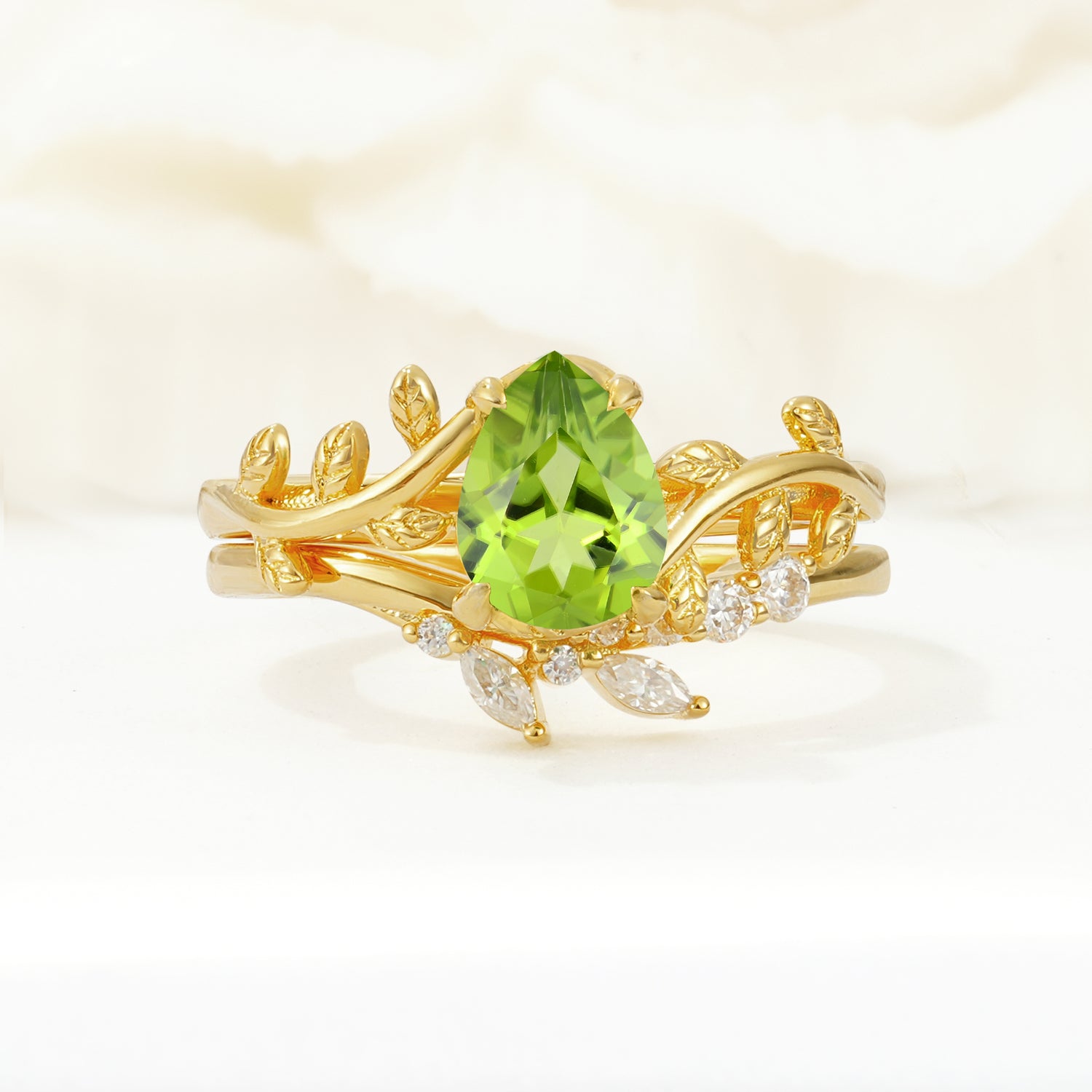 Nature-Inspired Pear Cut Peridot Bridal Ring Set