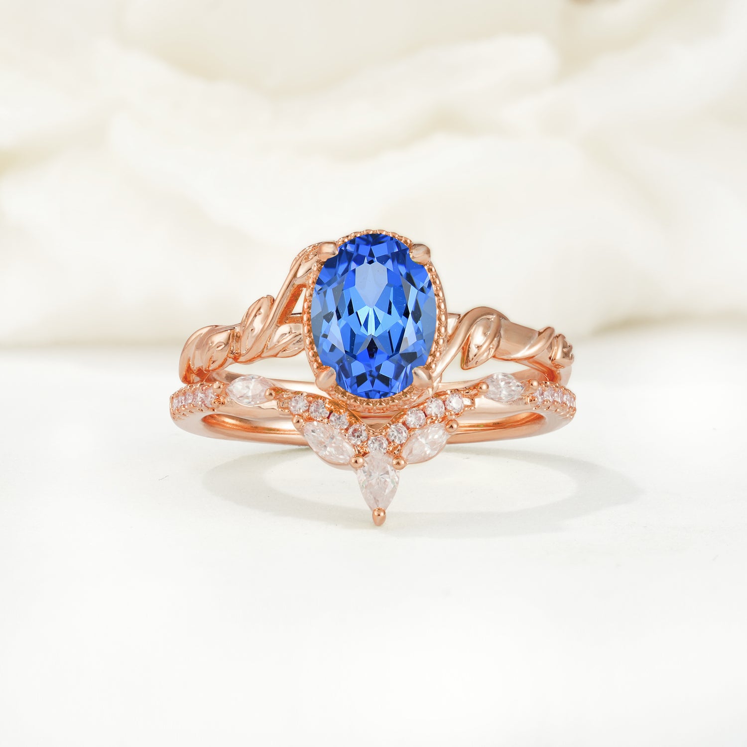 Nature-Inspired Oval-Cut Sapphire Bridal Ring Set