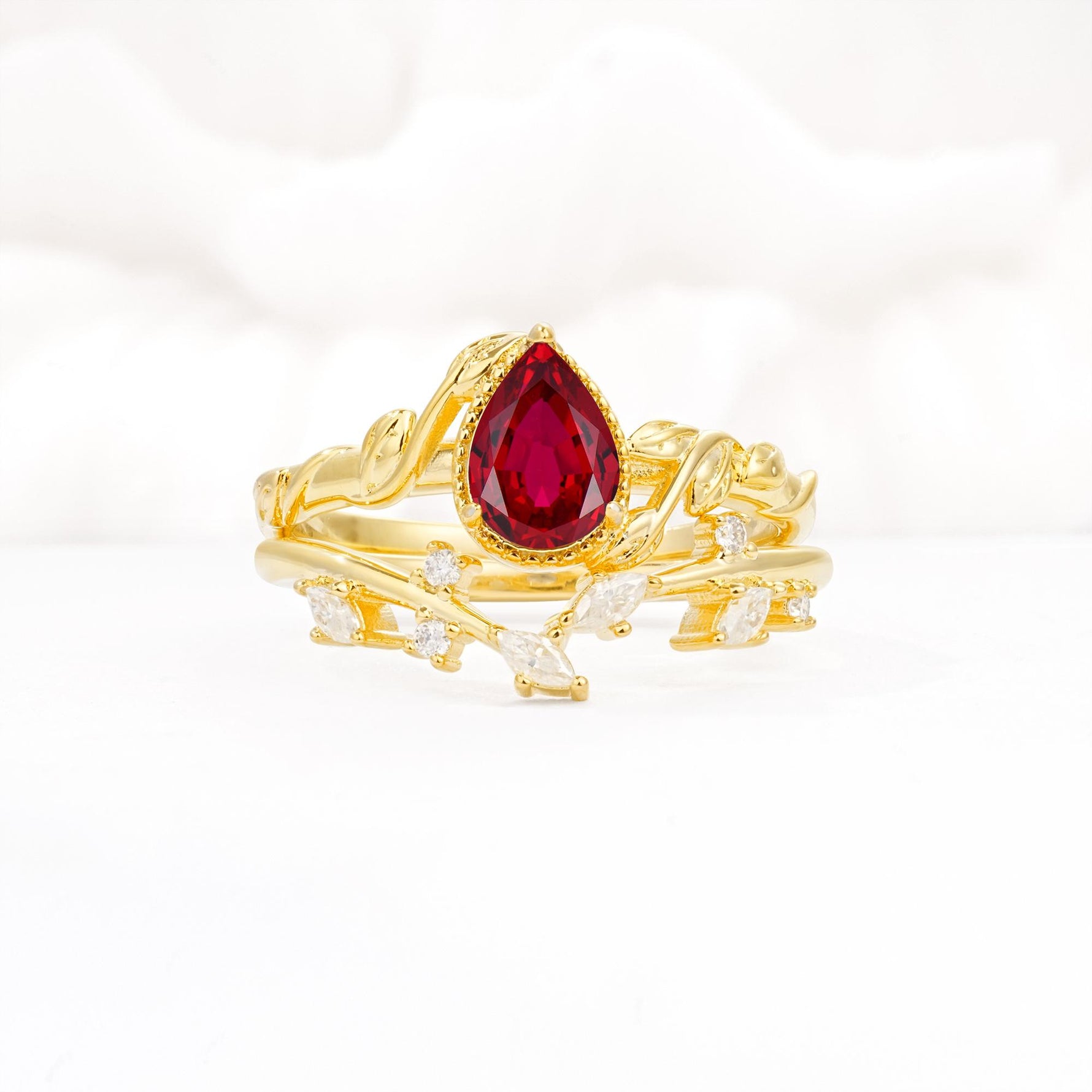 Nature-Inspired Bezel Pear Cut Ruby Engagement Ring Set - Yellow-Gold