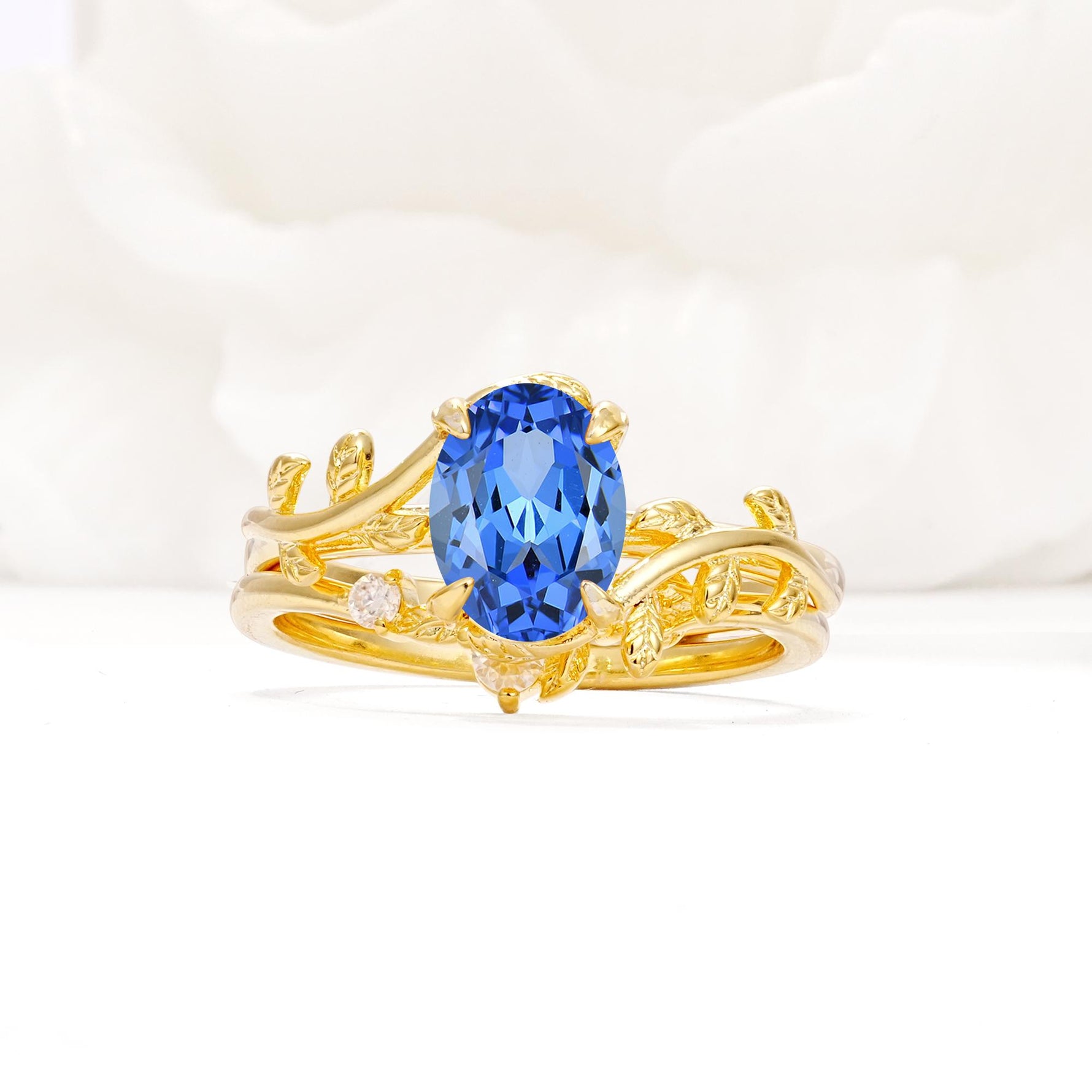 Nature-Inspired Oval Cut Sapphire Engagement Ring Set with Leaf Accents - Yellow-Gold