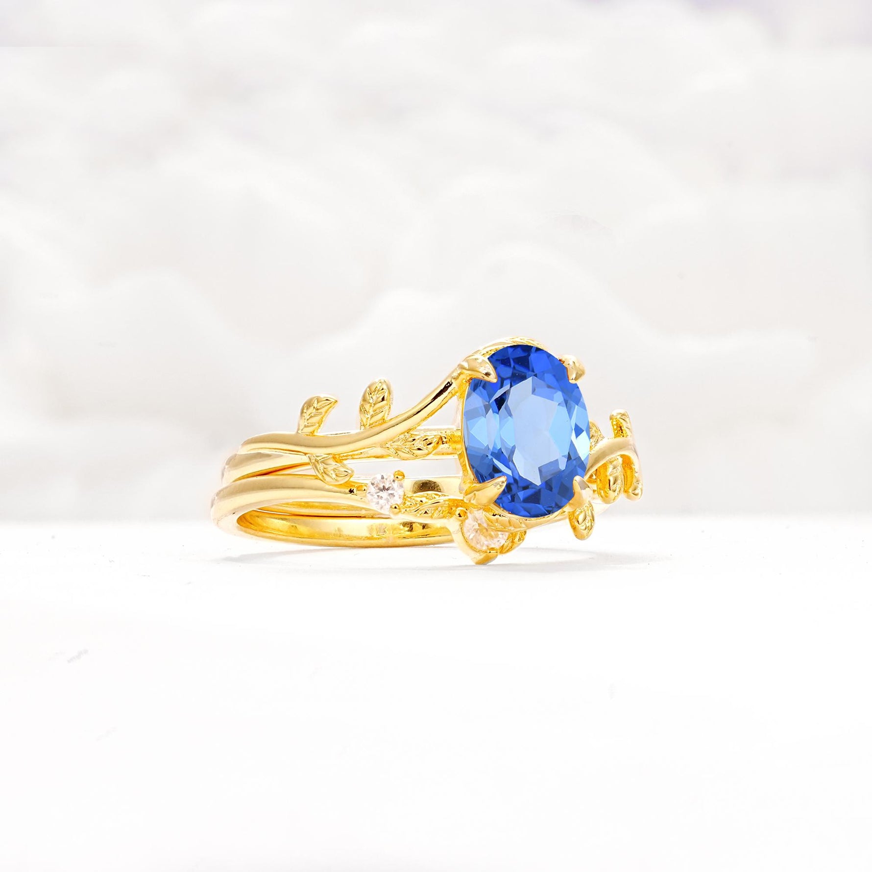 Nature-Inspired Oval Cut Sapphire Engagement Ring Set with Leaf Accents - Rose-Gold