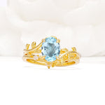 Nature-Inspired Oval Cut Aquamarine Engagement Ring Set with Leaf Accents - Yellow-Gold