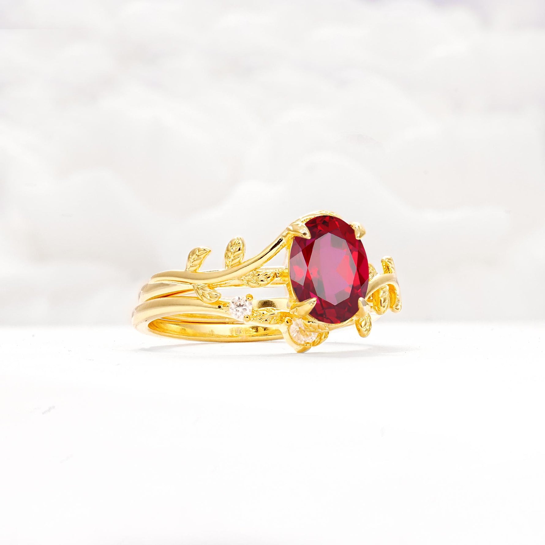 Nature-Inspired Oval Cut Ruby Engagement Ring Set with Leaf Accents - Rose-Gold