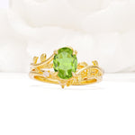 Nature-Inspired Oval Cut Peridot Engagement Ring Set with Leaf Accents - Yellow-Gold
