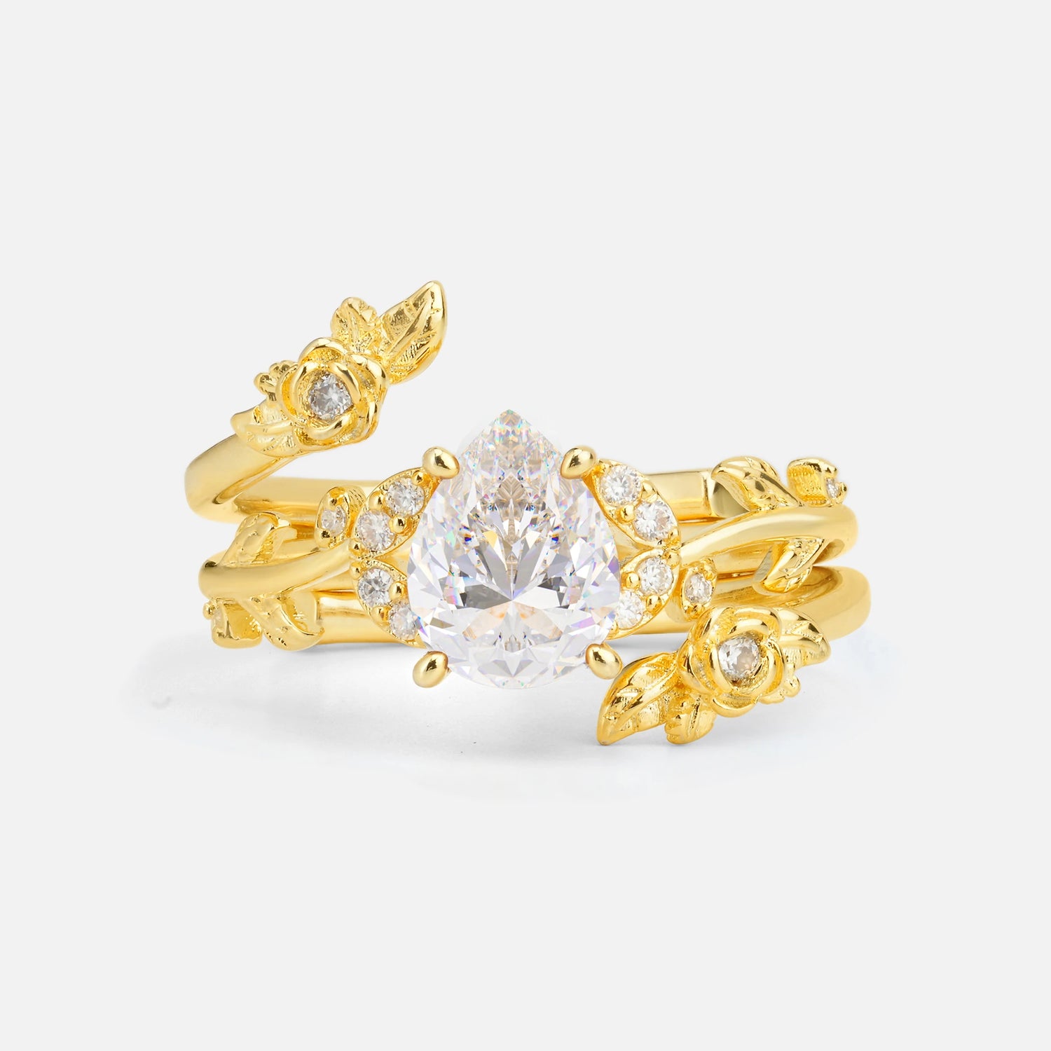 Pear Cut Moissanite Floral Vine Bridal Ring Set