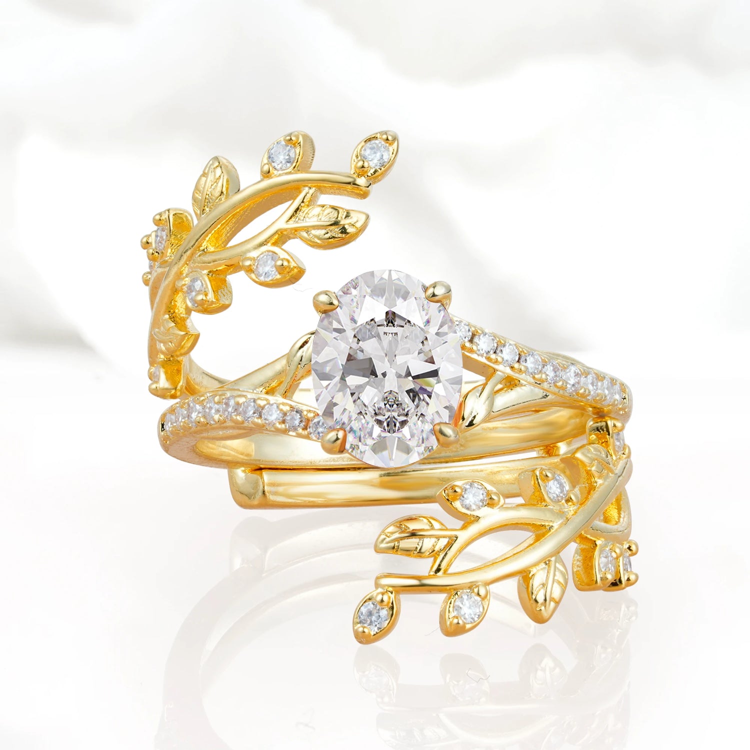 Nature-Inspired Gold Leaf Moissanite Engagement Ring Set with Oval Cut