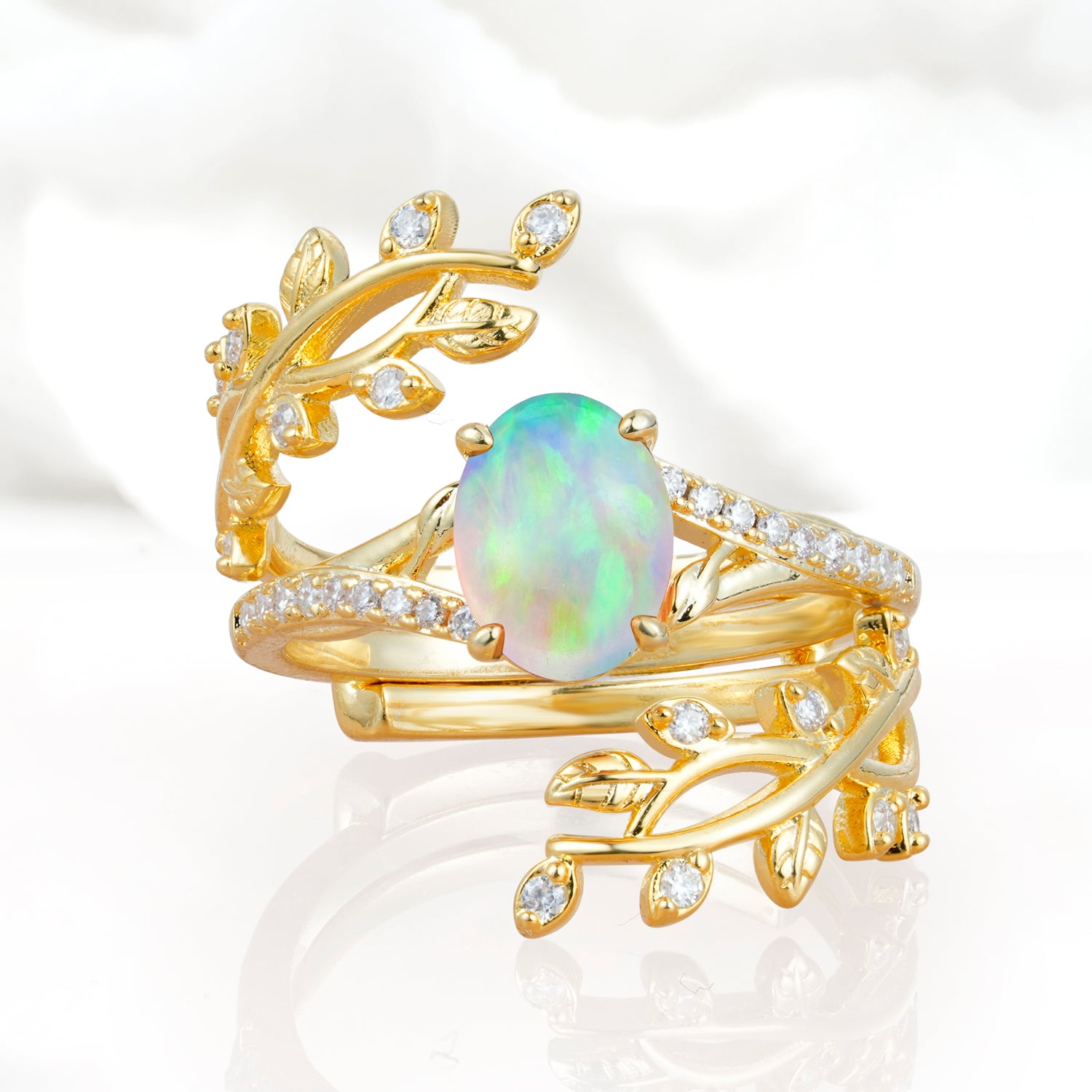 Nature-Inspired Gold Leaf Opal Bridal Ring Set with Oval Cut