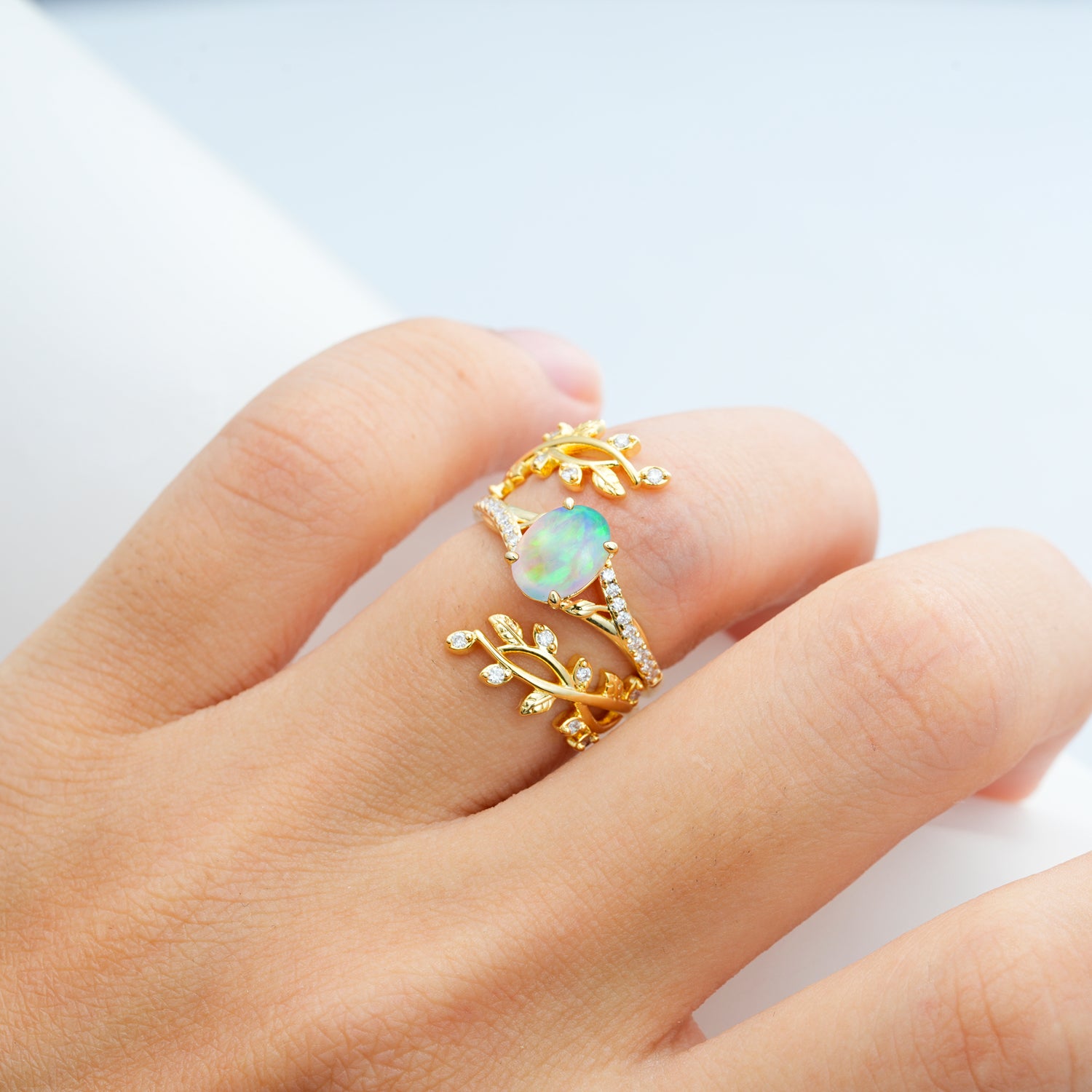 Nature-Inspired Gold Leaf Opal Bridal Ring Set with Oval Cut