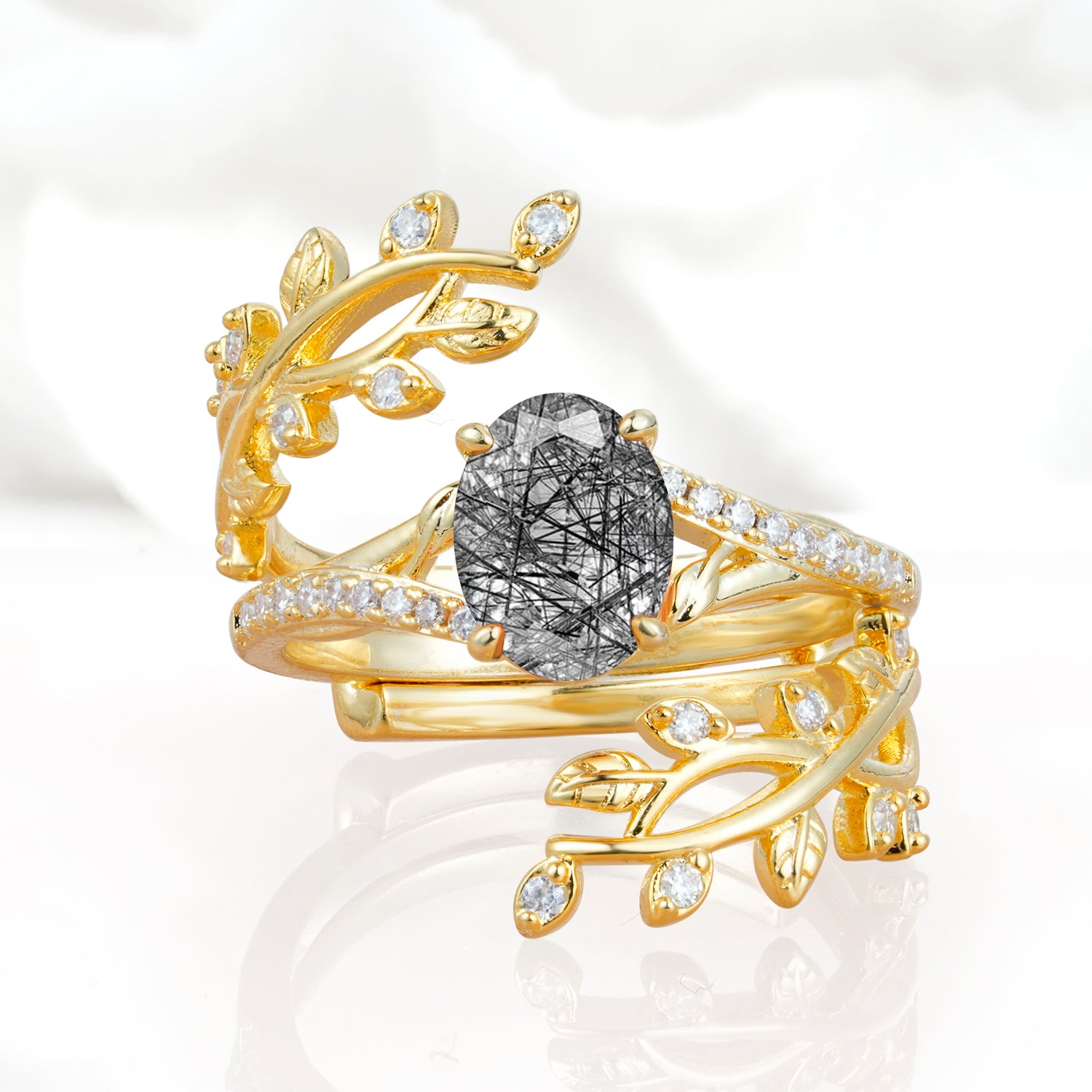 Nature-Inspired Gold Leaf Black Rutilated Quartz Bridal Ring Set with Oval Cut