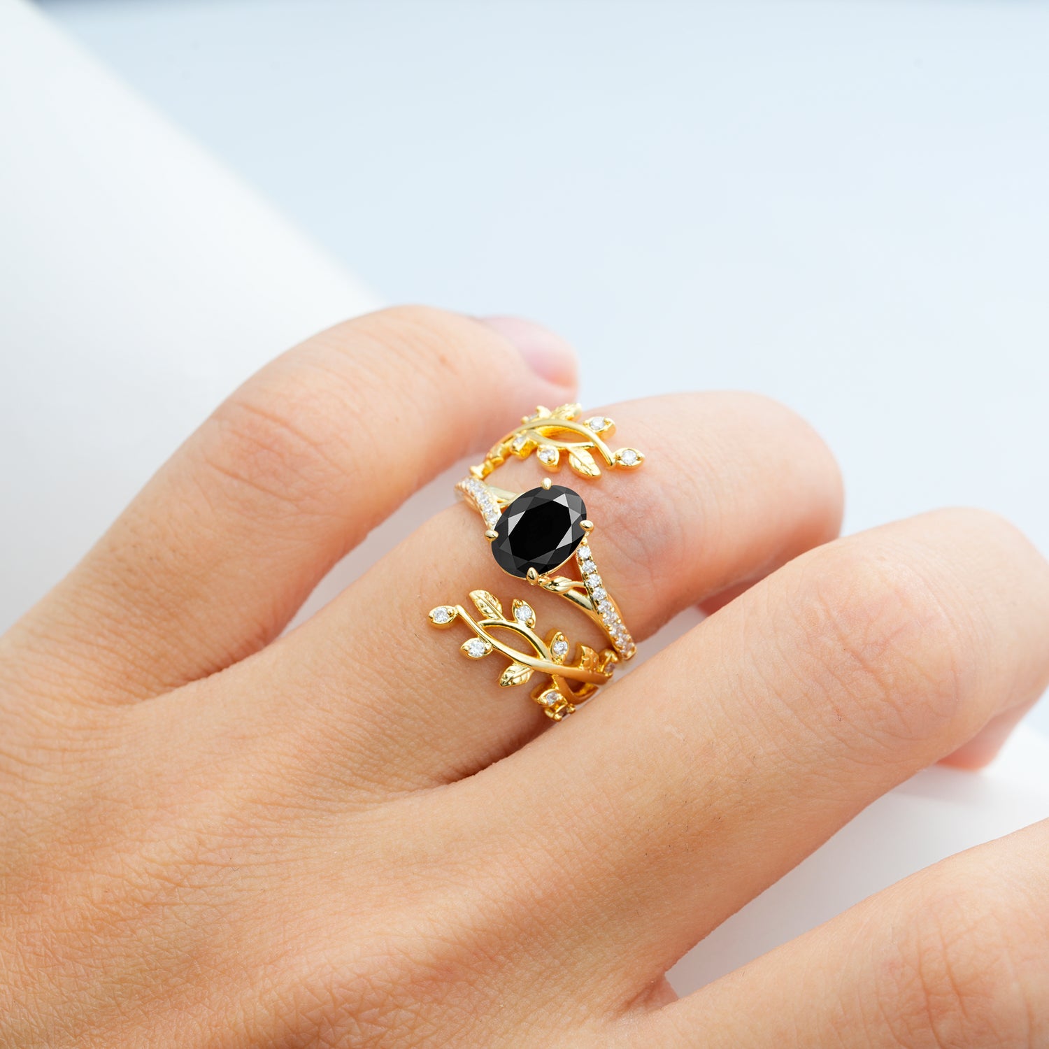 Nature-Inspired Gold Leaf Black Onyx Bridal Ring Set with Oval Cut