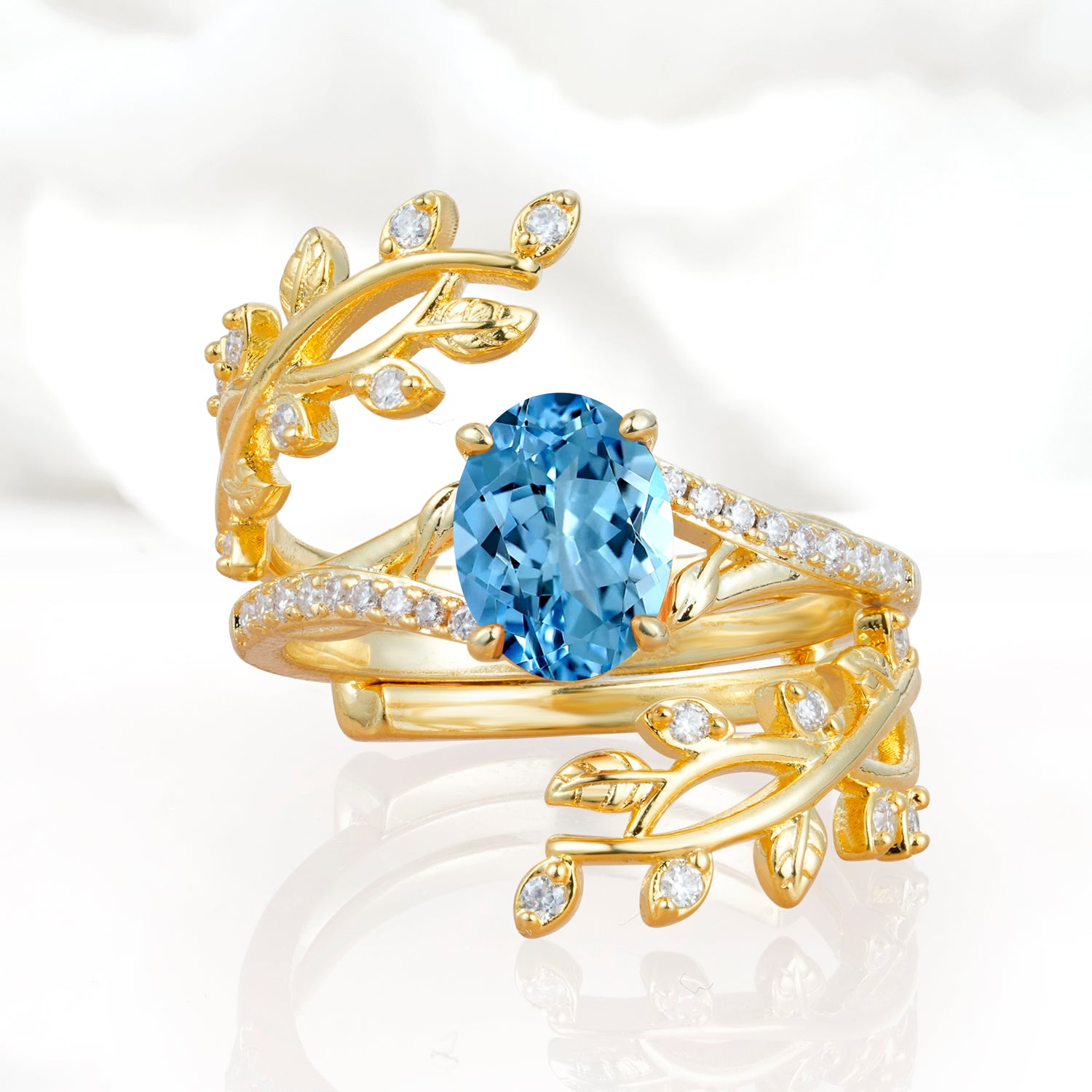 Nature-Inspired Gold Leaf Aquamarine Bridal Ring Set with Oval Cut