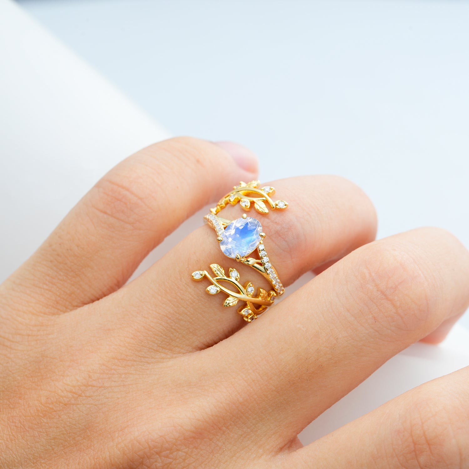 Nature-Inspired Gold Leaf Moonstone Bridal Ring Set with Oval Cut