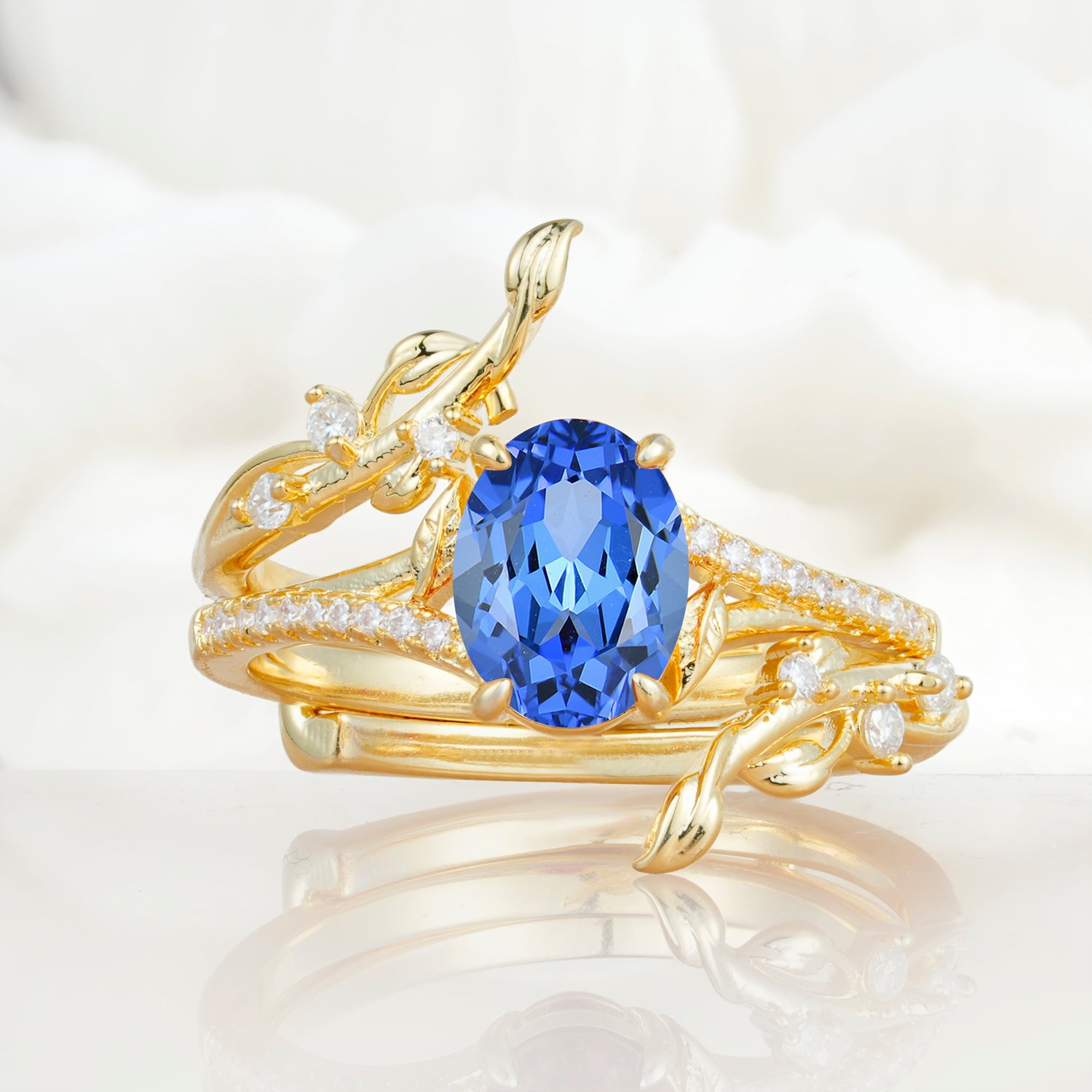 Nature-Inspired Oval Cut Sapphire Bridal Ring Set for Proposa