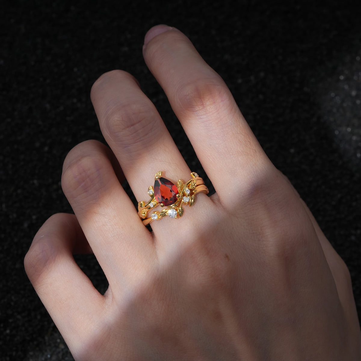 Nature-Inspired Pear Cut Garnet Engagement Ring Set with Twisted Vine Accents