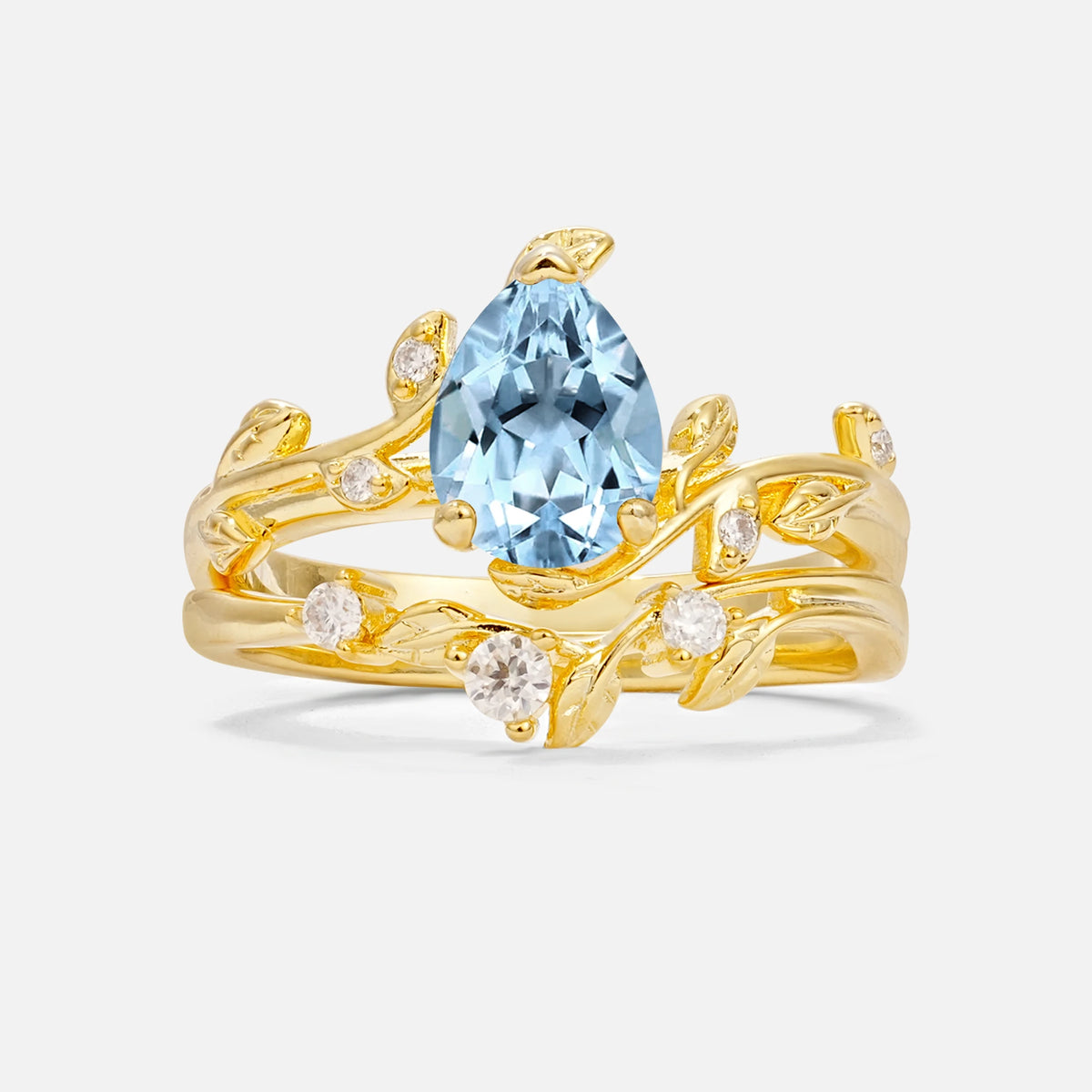 Nature-Inspired Pear Cut Aquamarine Engagement Ring Set with Twisted Vine Accents