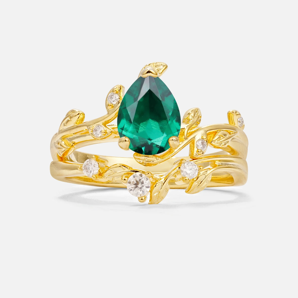 Nature-Inspired Pear Cut Emerald Engagement Ring Set with Twisted Vine Accents
