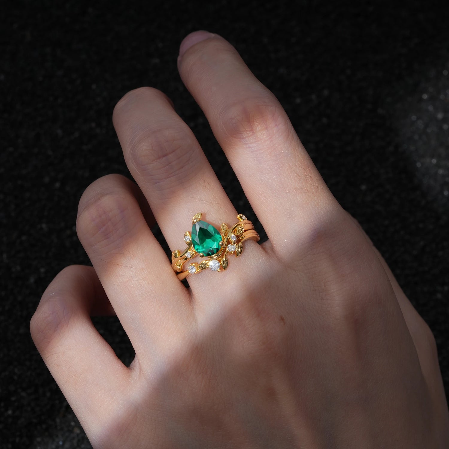 Nature-Inspired Pear Cut Emerald Engagement Ring Set with Twisted Vine Accents