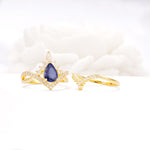 Tiara Pear Cut Tanzanite Bridal Ring Set with Chevron Enhancer Band - Additional view