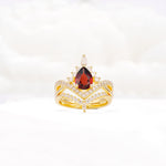 Tiara Pear Cut Garnet Bridal Ring Set with Chevron Enhancer Band - Yellow-Gold