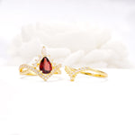 Tiara Pear Cut Garnet Bridal Ring Set with Chevron Enhancer Band - Additional view