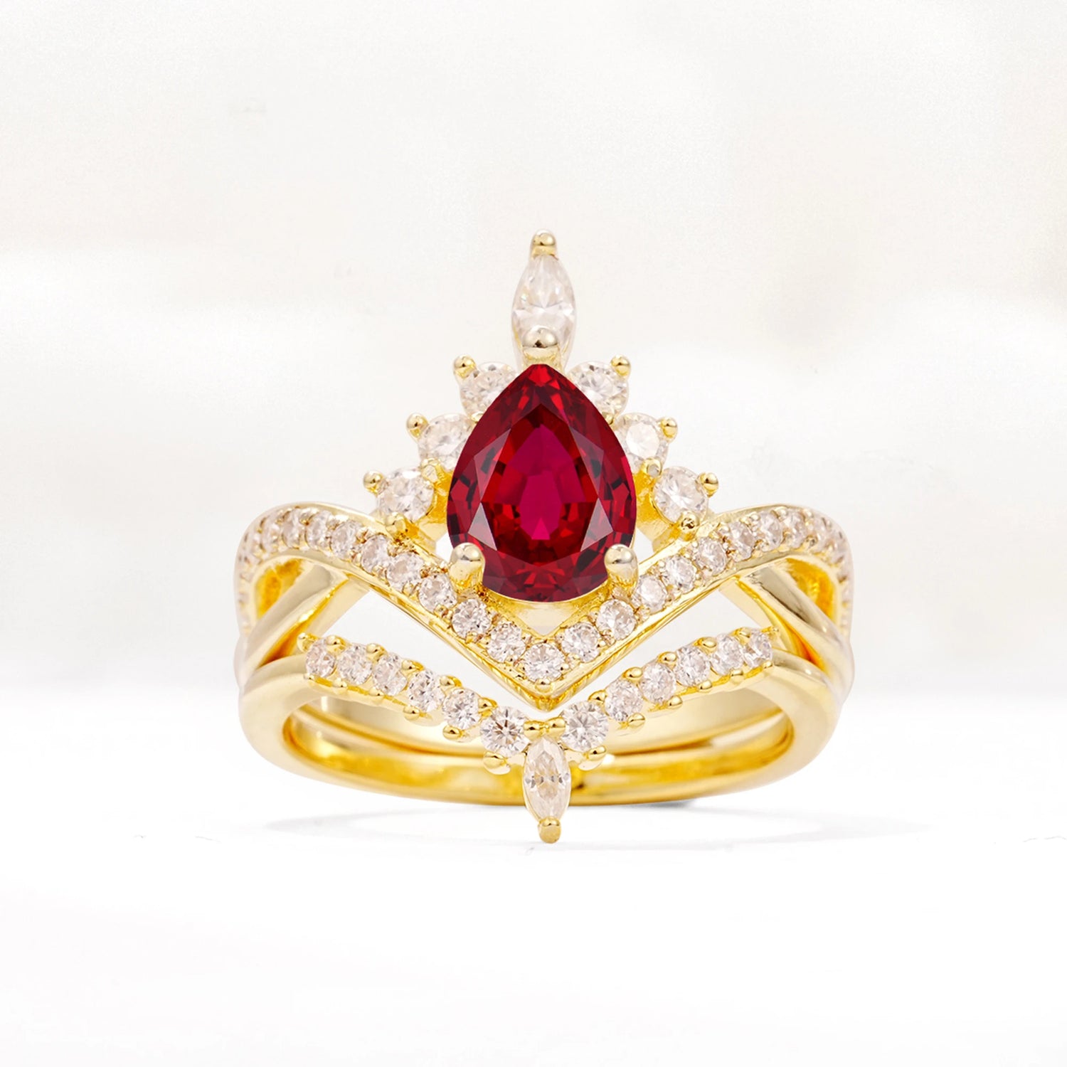 Tiara Pear Cut Ruby Bridal Ring Set with Chevron Enhancer Band