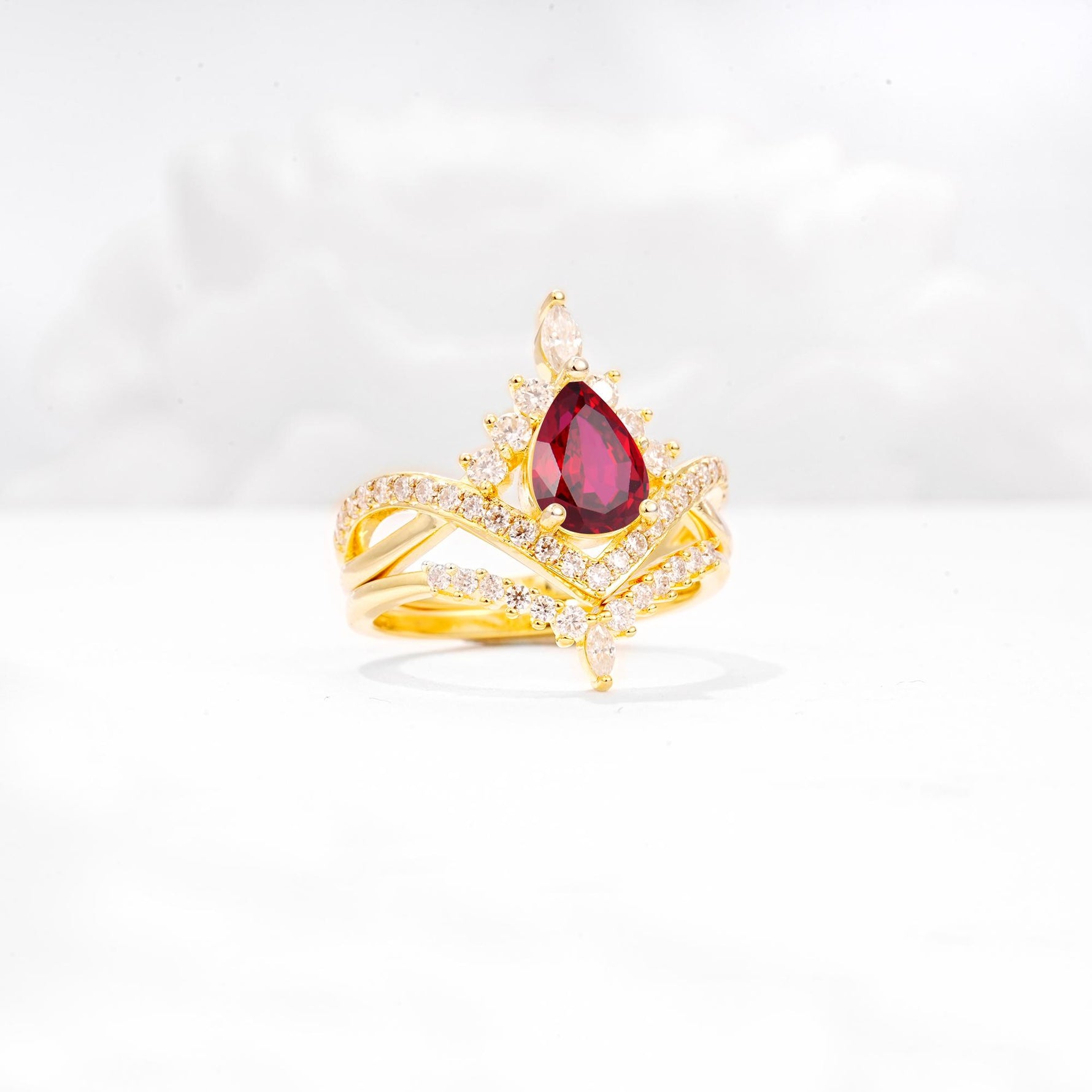 Tiara Pear Cut Ruby Bridal Ring Set with Chevron Enhancer Band - Rose-Gold